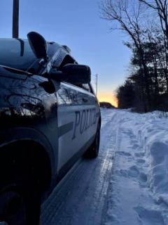Ayer Police Department Cruiser On Snowy Road